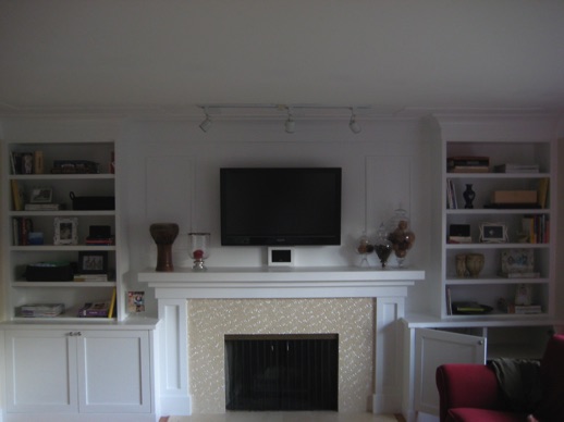 White media centre and mantel